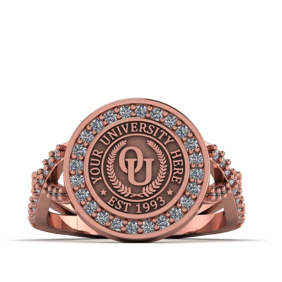 Rose gold ring with a circular design on a white background