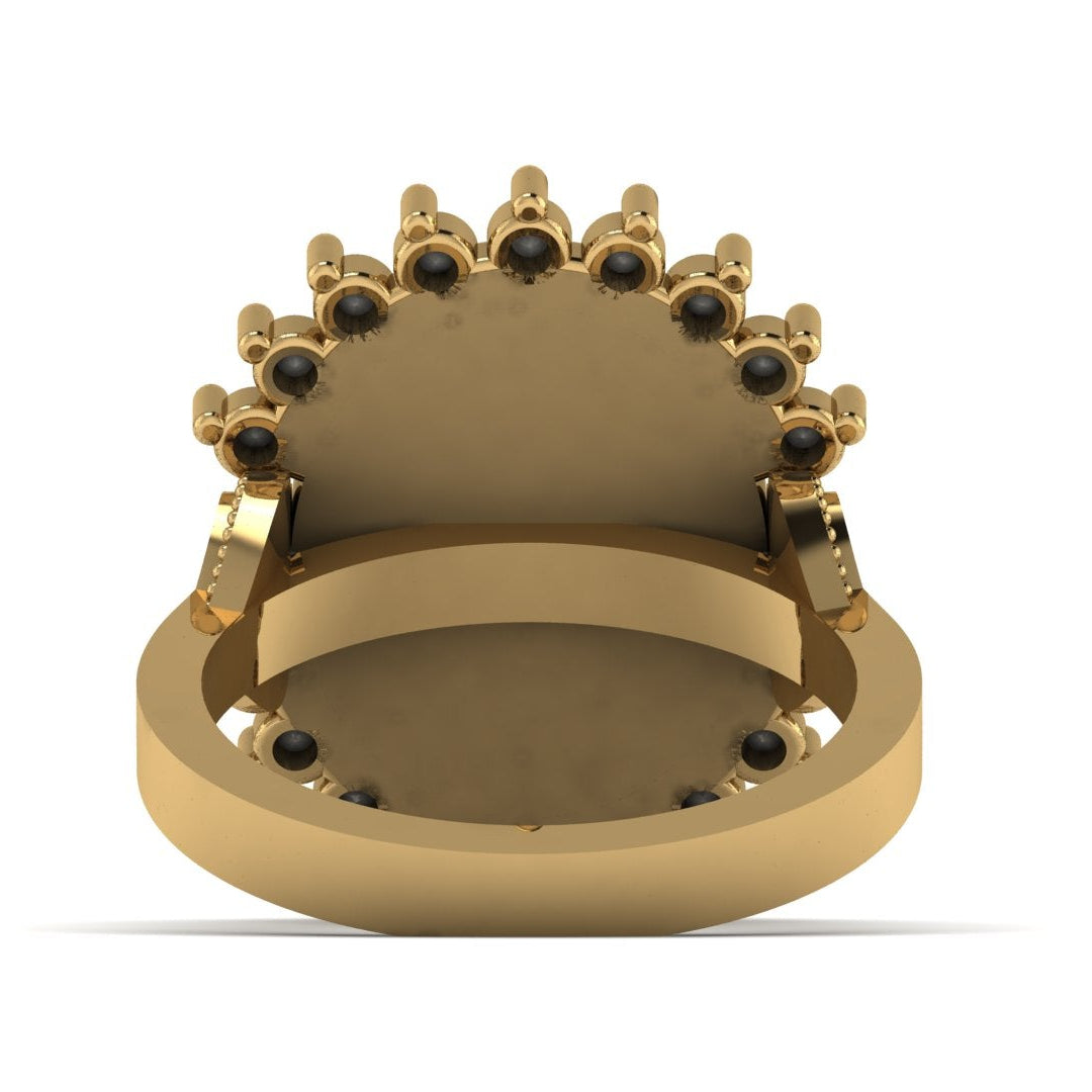Gold ring with black stones on a white background