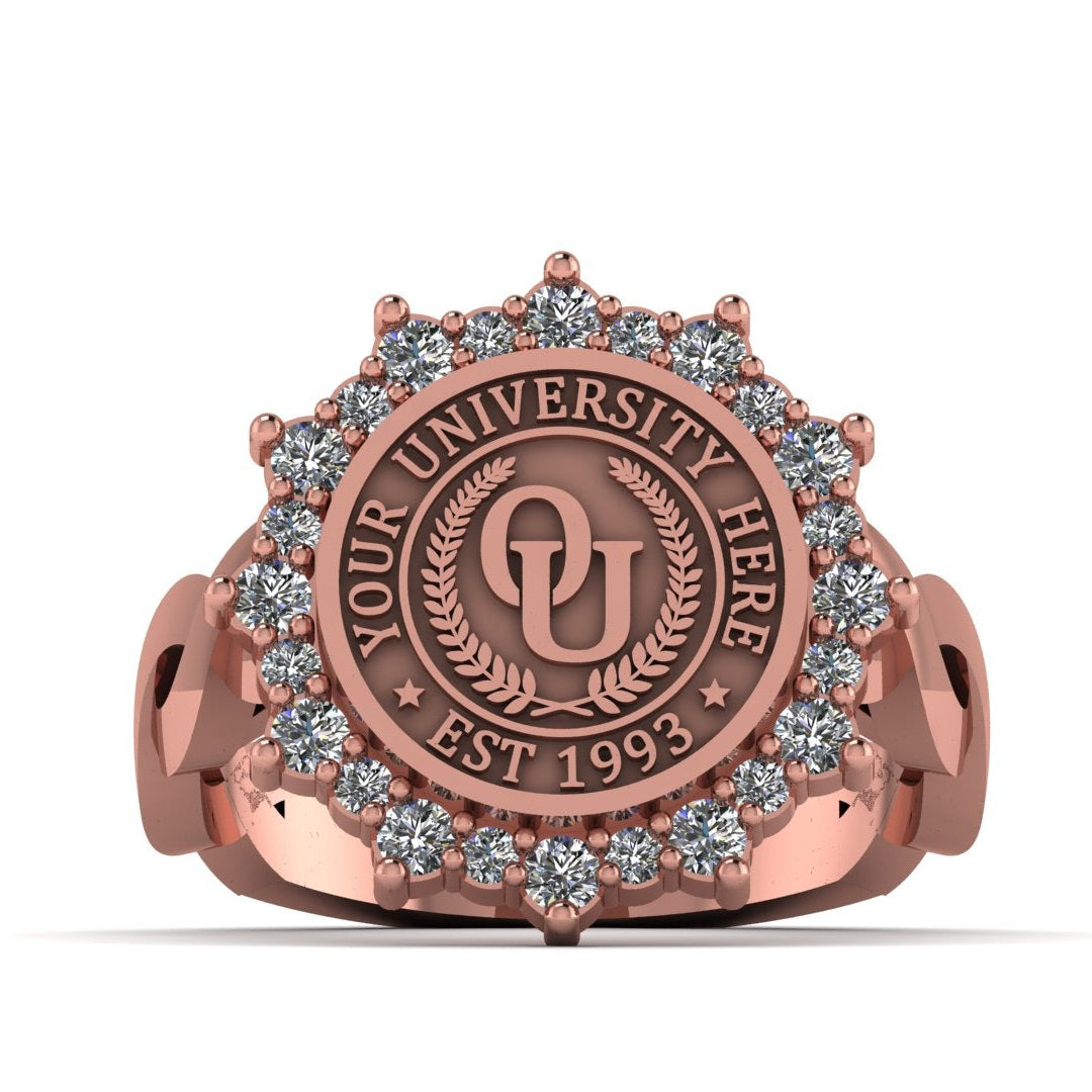 Rose gold university ring with 'OU' emblem and gemstones on a white background