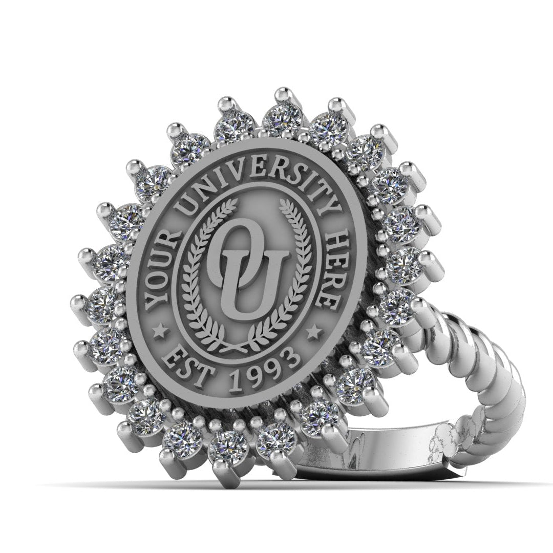 Silver ring with a university crest design on a white background