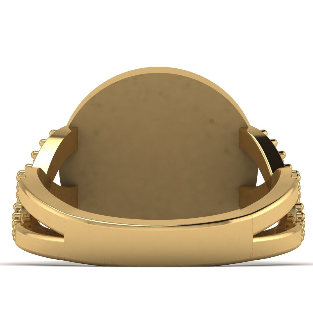 Gold ring with a heart-shaped center on a white background