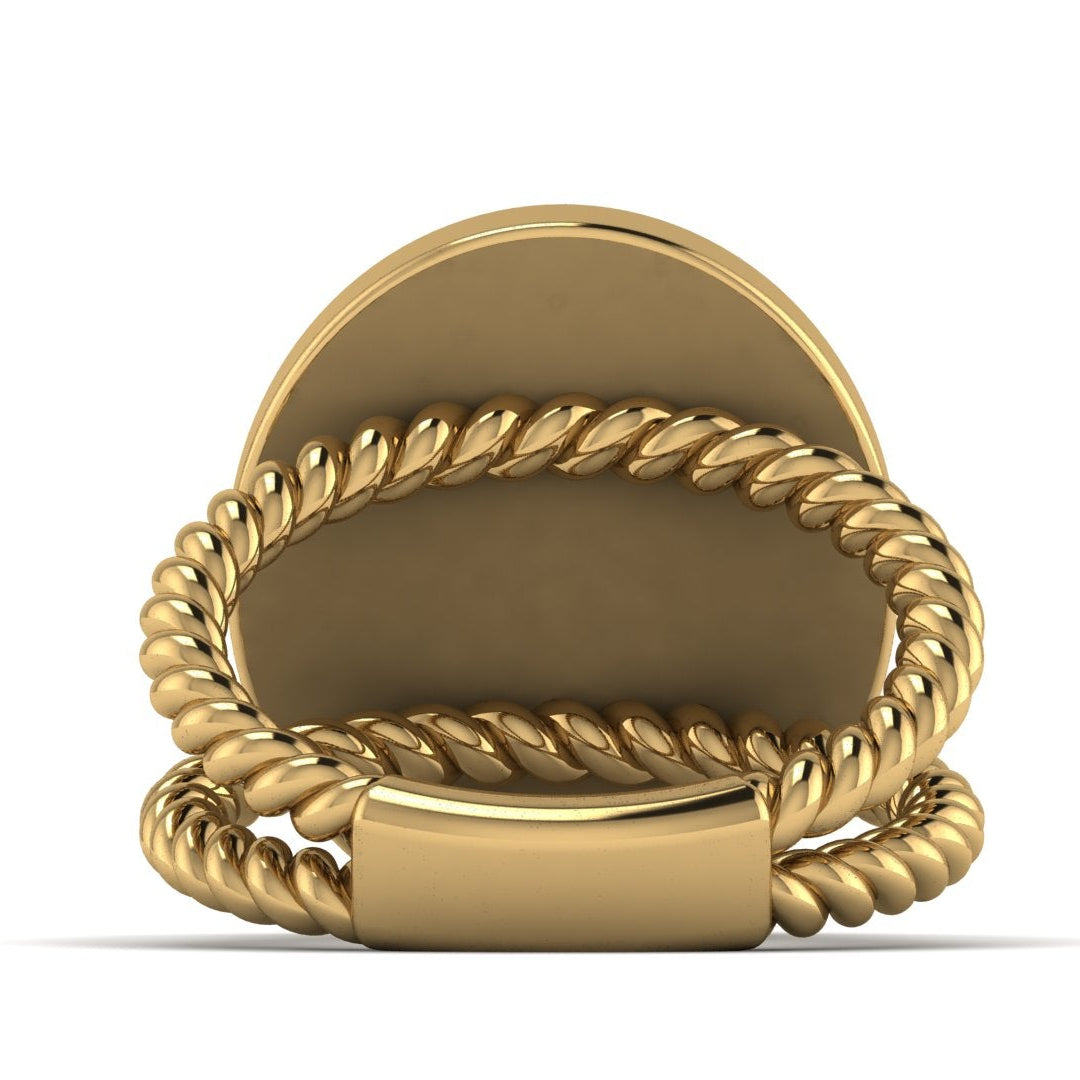 Gold ring with a rope design on a white background