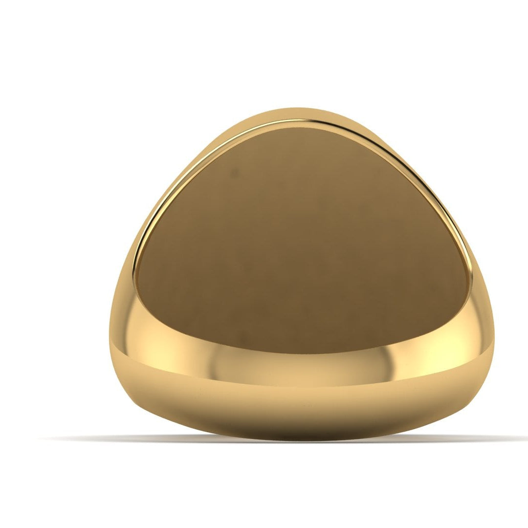 Gold ring with a unique design on a white background
