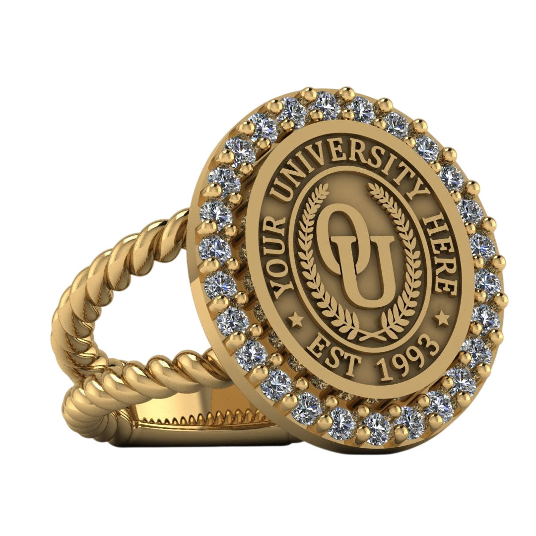 Gold ring with engraved text and gemstones on a white background