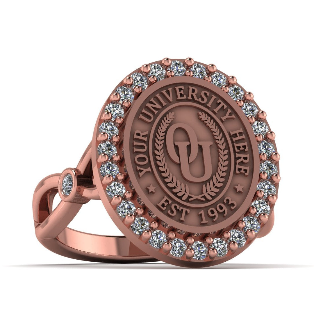 Rose gold ring with engraved design on a white background