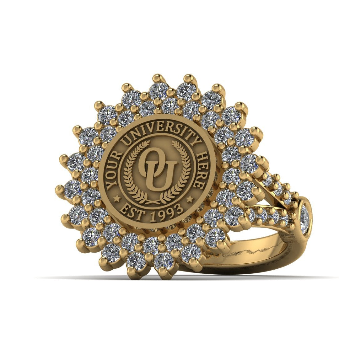 Gold ring with diamond accents and a central emblem on a white background