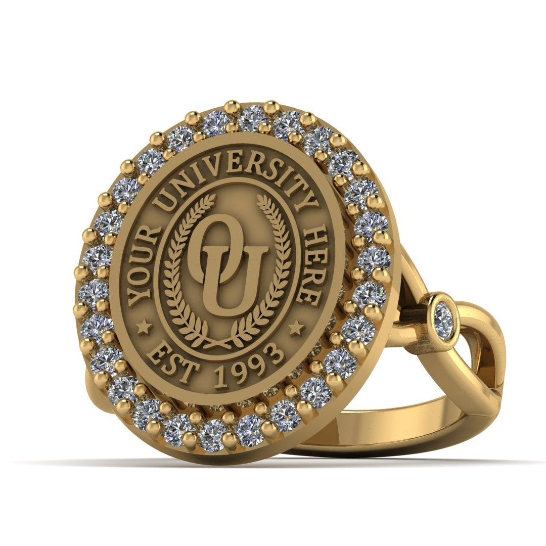 Gold ring with gemstones and 'Your University Here' engraving on a white background