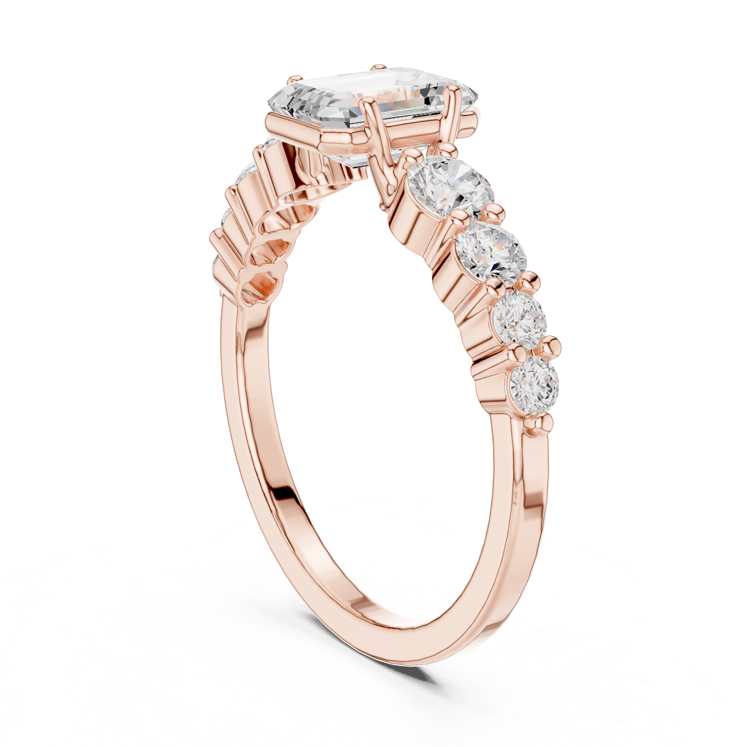 Emerald Cut Three-Stone Engagement Ring with Graduated Round Diamond Accents