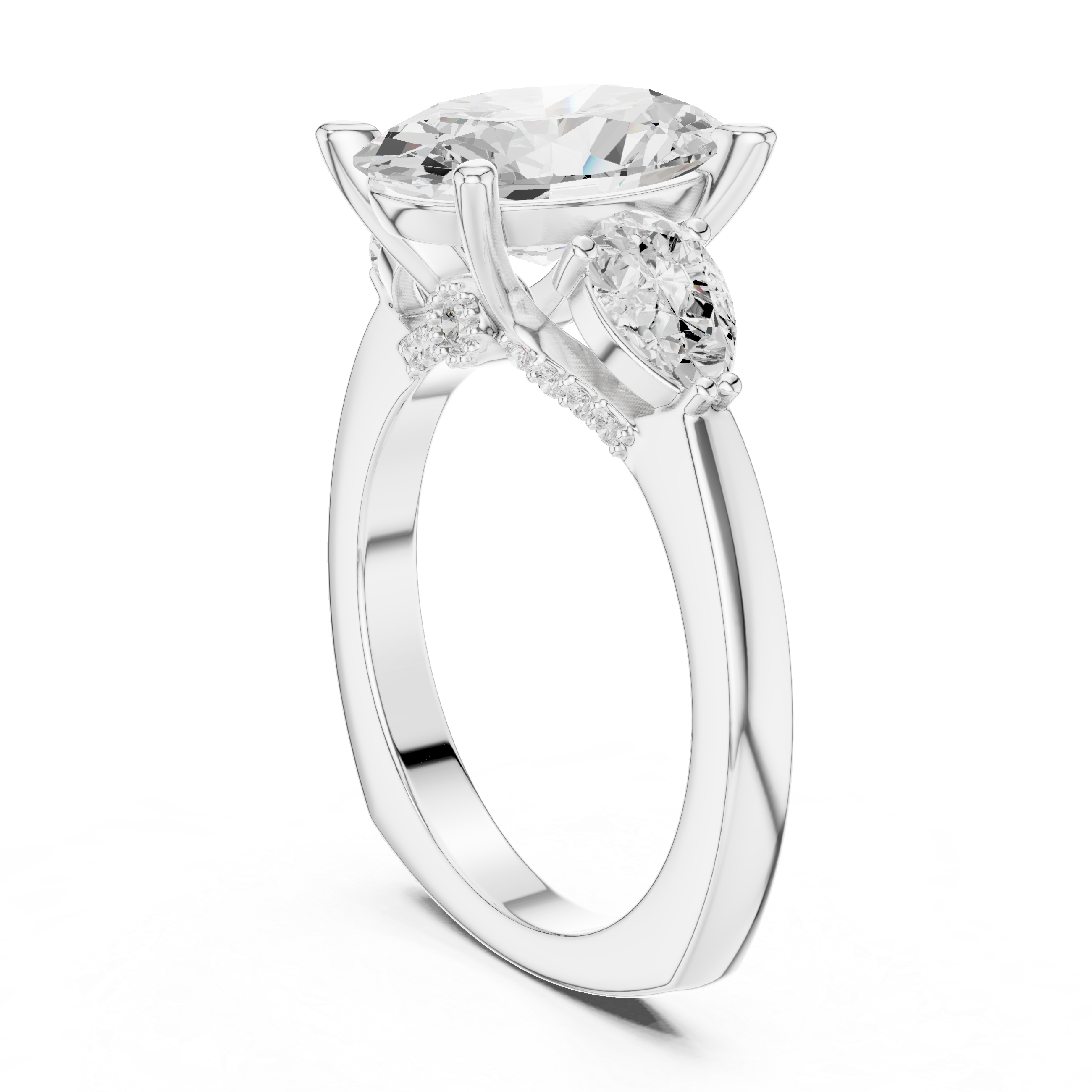 Oval-Cut Three-Stone Engagement Ring with Pear-Cut Side Stones and Hidden Accent Details