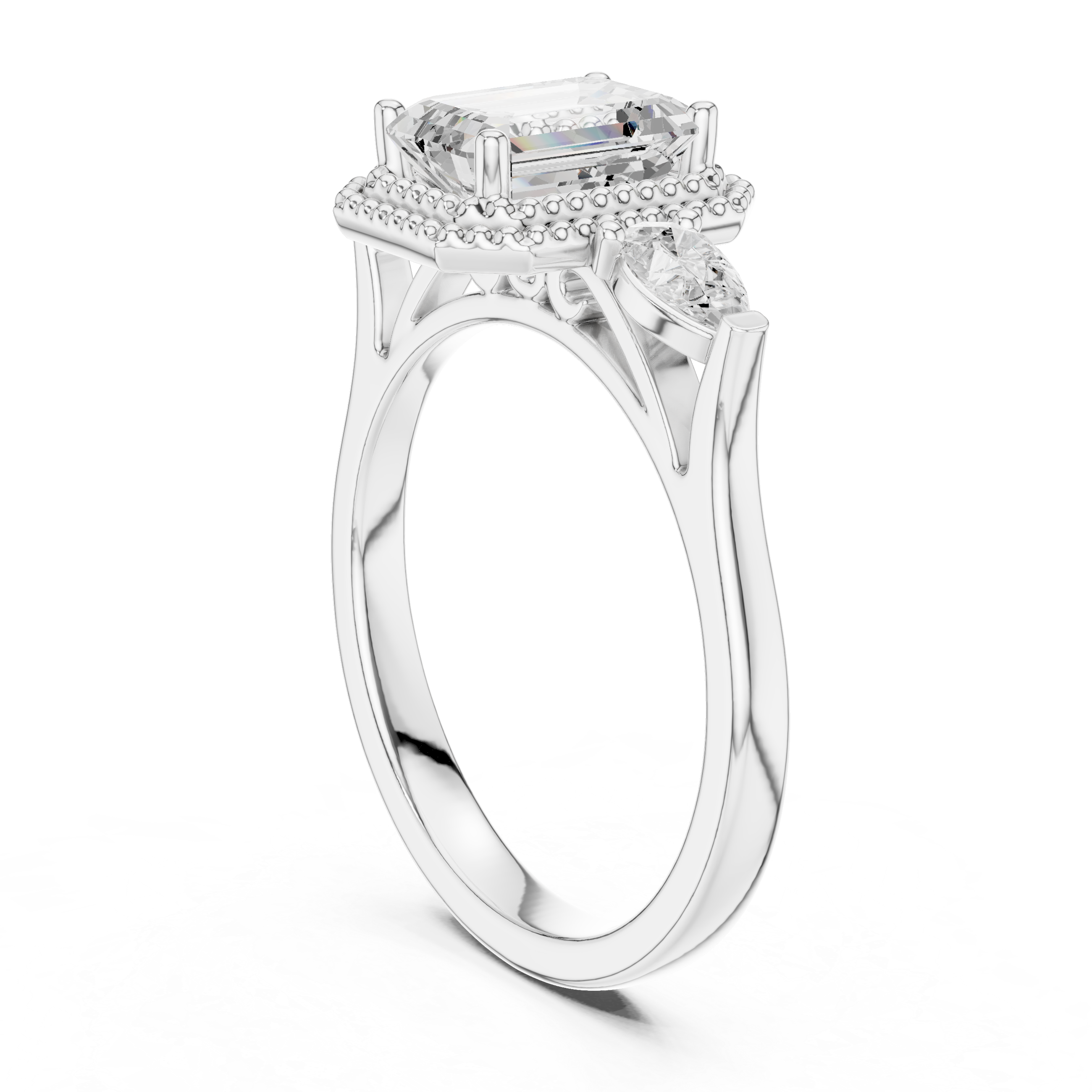Emerald-Cut Three-Stone Engagement Ring with Pear Side Stones and Double Beaded Frame